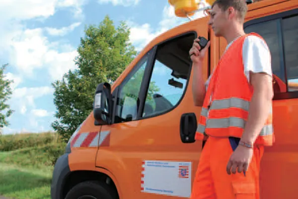 Highway worker and van