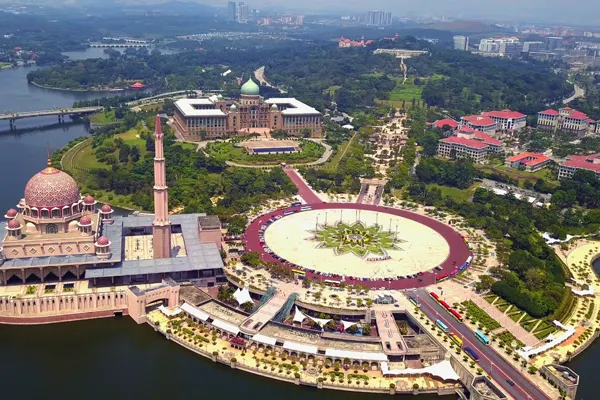 Aerial view of Putra mosque with garden landscape design and Putrajaya Lake, Putrajaya